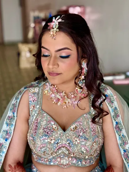 An eyes-closed shot to highlight the soft blending of the pastel eyeshadows. This look is dreamy and perfect for a day-time event.
