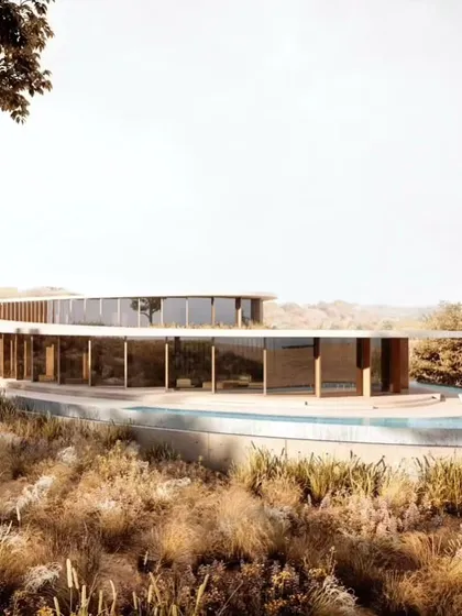 This is a view of Amar Villa, a boutique hotel I designed in Udaipur. The building follows a seamless calligraphic curve that maximizes views of the surrounding mountains while minimizing impact on the natural topography, creating a space of sustainable luxury.