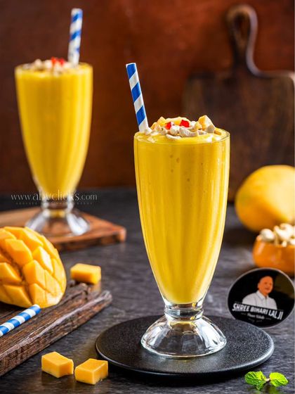 A bright and creamy mango milkshake, a perfect summer beverage.