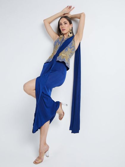 A dynamic, full-body pose that showcases the entire outfit from The Luxury Pop in a high-fashion, editorial style.