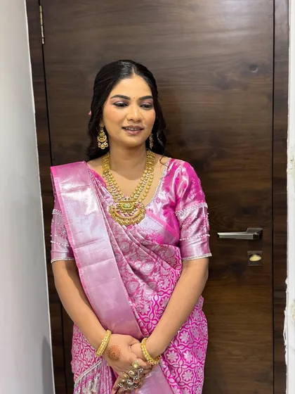 Another shot of the lotus look, showing the beautiful sheen of the silk saree and the flawless makeup.