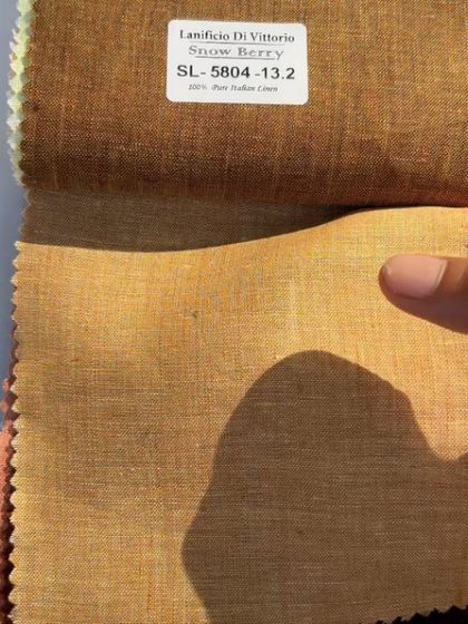 A swatch of 100% pure Italian linen from Lanificio Di Vittorio, a premium choice for summer suits and shirts.