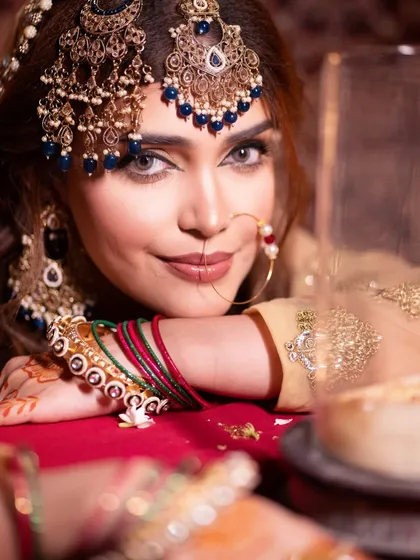 My students learn to create stunning, culturally rich looks inspired by trends like Heeramandi. We dive deep into traditional makeup artistry, mastering the details of everything from eye makeup to jewelry placement for a truly authentic and glamorous result.