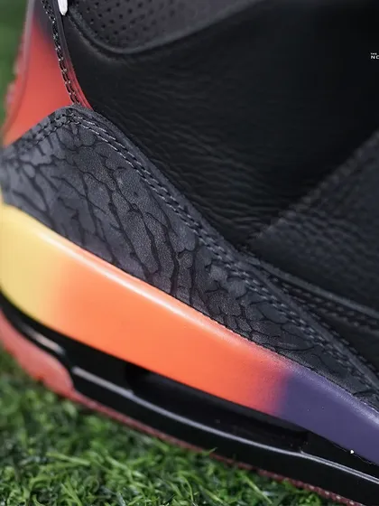 Macro shot of the elephant print and the purple-to-orange gradient on the midsole of the Jordan 3 J Balvin 'Rio'.