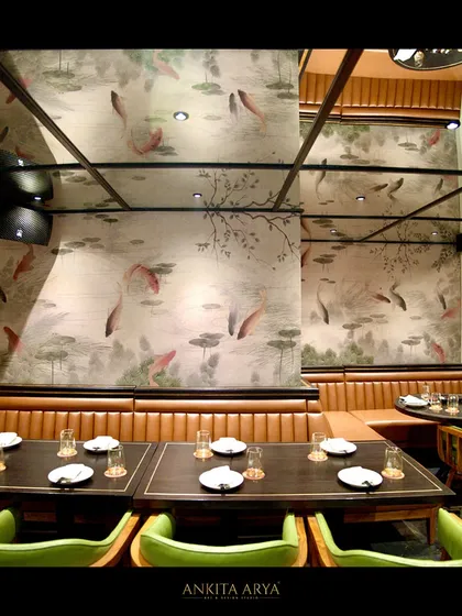 For the Shanghigh restaurant, I designed this immersive ceiling and wall mural featuring a serene koi pond. The artwork transforms the dining space, creating a whimsical and oriental ambiance that elevates the entire guest experience.