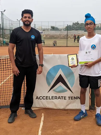 Gurrshan Singh Mehta with his coach and finalist award at our home courts. We are proud of his consistent performances.