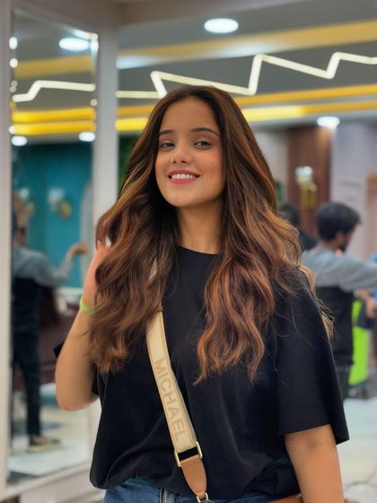 This client is glowing with her new hair. A great color can truly transform your entire look.