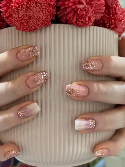 The final result: beautiful, sparkling glitter nails that are perfect for the holiday season.