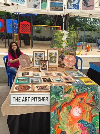 Here I am at my art stall during an Onam celebration in Bangalore. Setting up at flea markets and pop-ups allows me to connect directly with people who appreciate art and share the stories behind each piece I create.