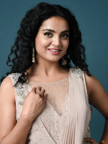Getting ready for Diwali with coordinated outfits. This shot showcases two distinct but complementary looks, one a draped gown and the other a chic indo-western set, perfect for a stylish festive gathering.