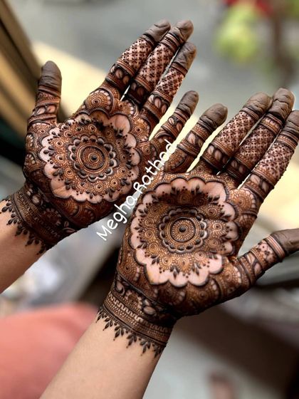 My love for mandalas shines in this design, where a large, intricate floral mandala on the palm is the star of the show.