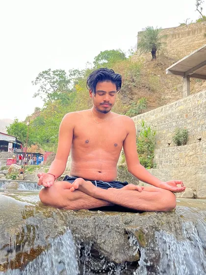 Meditating amidst the soothing sounds of a waterfall. Nature is the ultimate yoga studio.