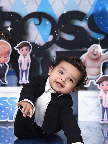 Who's the boss? This little guy is, in his "Boss Baby" themed photoshoot. The suit and tie are the perfect touch for this fun and cheeky setup.