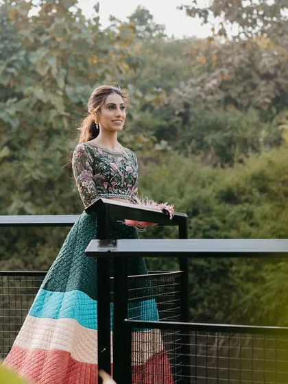 A solo portrait of the bride at her carnival event.
