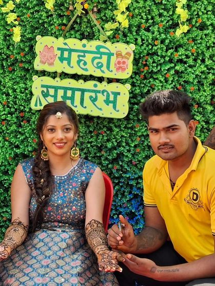 An artist from my team with a bride at her mehndi ceremony.