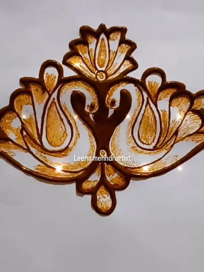 A beautiful swan motif, perfect as a decorative element. The two swans form a heart shape, making it a romantic addition to any bridal design.
