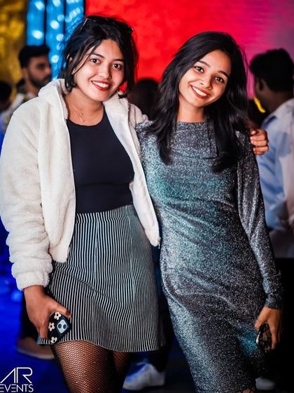 Two friends enjoying the music and the vibe. My Wednesday nights are the perfect mid-week escape.