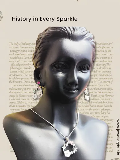 A beautiful floral pendant and earring set displayed on a mannequin, showcasing our heritage-inspired designs.