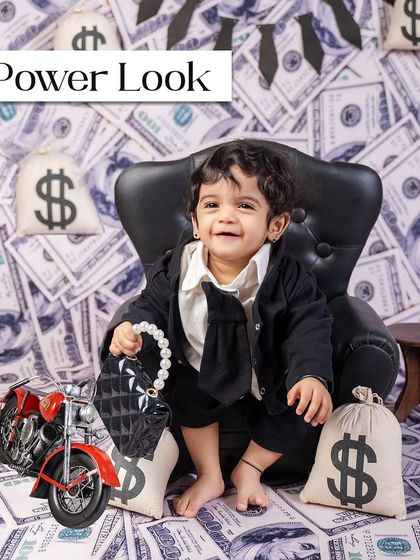 Serving a power look in miniature size. The "Boss Baby" theme is all about confidence and fun, and this little one is delivering with a smile.