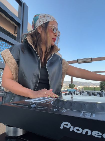 A close up on the decks, focused on delivering a smooth mix.