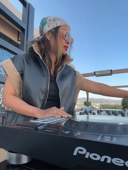 A close up on the decks, focused on delivering a smooth mix.