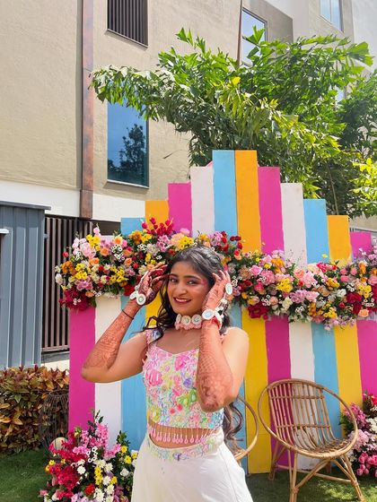A playful moment in my custom-designed carnival wear. The outfit features a hand-painted top and pants, along with a matching choker and bracelets I also created.