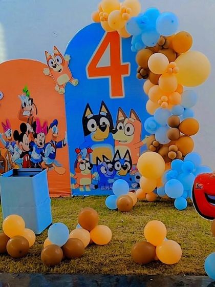 Another angle of the 'Bluey' and friends themed party, also showing a 'Cars' character cutout. I can mix and match characters your child loves.