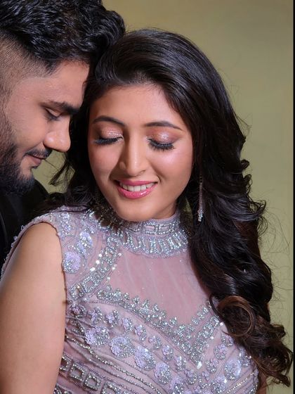 A bit of glam for this engagement look. The shimmery eyeshadow and glowing skin create a beautiful, celebratory style.