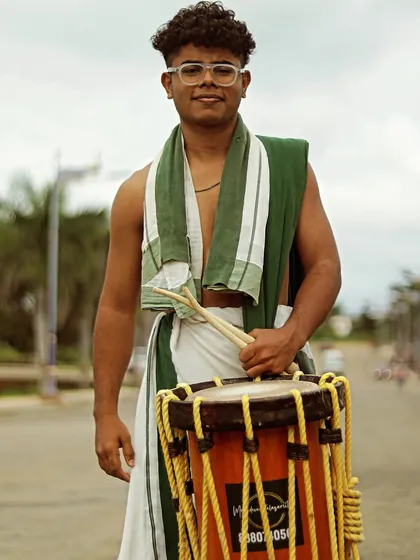 A portrait of one of our young, energetic artists, ready with his Chenda and sticks.