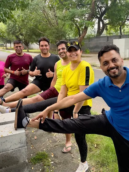 Stretching it out together after a good run. These post-run sessions are great for preventing injuries and sharing a few laughs.