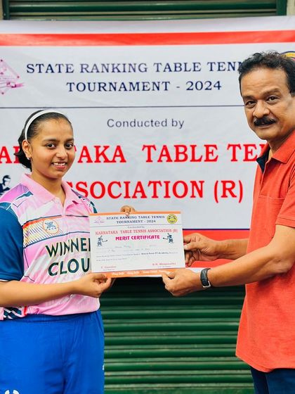 Sahana H Murthy receiving her merit certificate for winning the U19 Girls Champion title at the 1st State Karnataka State Ranking 2024.