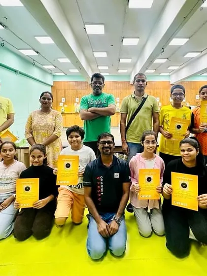 More happy campers and their parents posing with coaches after a camp session. I encourage parental involvement and make sure they see the progress their children are making.