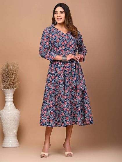 The women's blue floral kurti dress, designed with a flattering wrap style and comfortable fit.