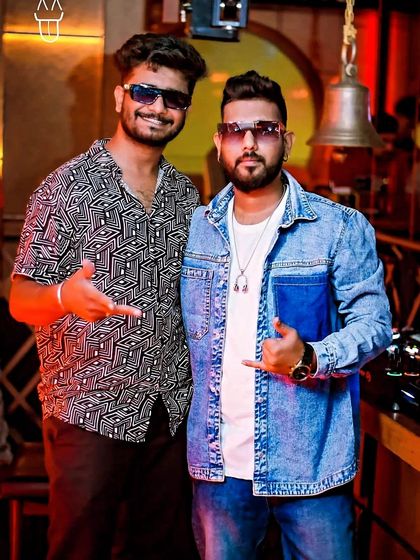 Posing with a fellow artist. Collaboration and friendship are key in this industry.