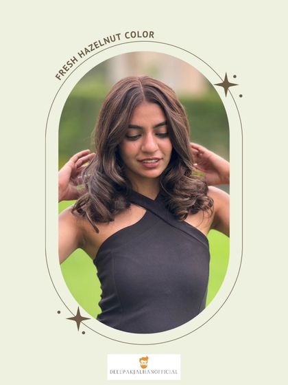 A closer look at the soft curls and chocolatey tones of this hazelnut color. It’s a luxe, trendy look that enhances the client's natural beauty.