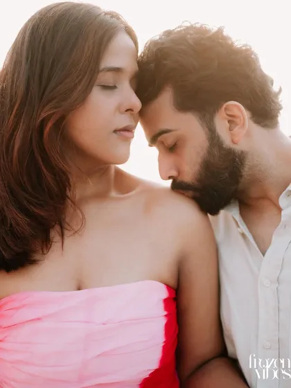 An intimate and tender moment between Anushka and Himanshu, captured in beautiful, soft light. This style of close-up portrait is perfect for highlighting emotion.