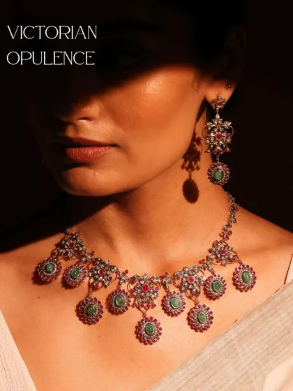 Inspired by a bygone era of grandeur, the Victorian Opulence set is perfect for traditional celebrations. It features an intricate design of rubies, emeralds, and diamonds with a classic, regal feel.