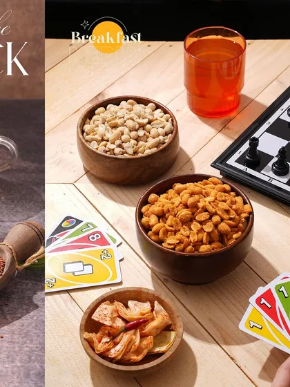 A fun, casual setup showing various snacks ready for game night. By including Uno cards and a chessboard, I created a relatable lifestyle scene that positions the snacks as perfect for sharing with friends.