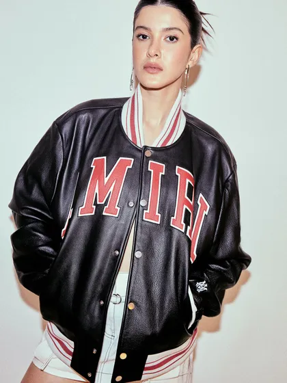 For Shanaya Kapoor, we created a modern, street-style look for the Amiri India launch. The focus was on a cool, confident energy, pairing a bold varsity jacket with custom safety-pin earrings for that perfect edge.