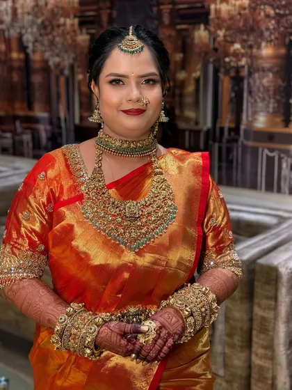 The same bride, looking confident and happy, ready for her wedding ceremony.