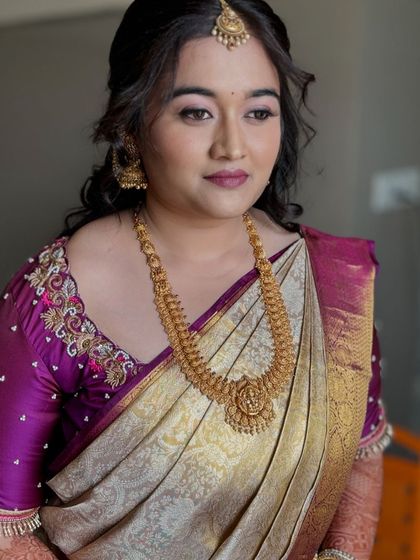 A three-quarter view of Nayana's engagement look, highlighting the soft contour and the elegant hairstyle.