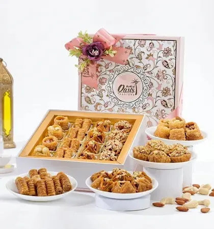 The same Royal Delight Hamper, this time in a beautiful pink floral box. We offer various packaging designs to match the theme of your celebration.