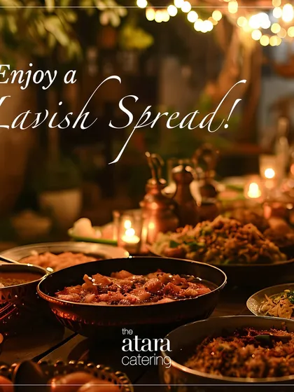 We create atmospheres that are as delightful as our food. This image of a lavish, candle-lit dinner spread captures the warm, celebratory, and abundant experience we provide for intimate gatherings.