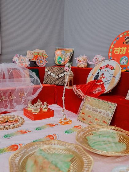 A table displaying the various items and gifts for a traditional wedding ceremony. We document all the thoughtful details that go into the celebration.