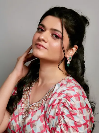 Another angle of the creative pink eyeliner look, showing how it can be both playful and chic.