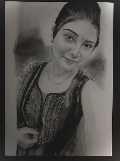 A charcoal sketch capturing a woman's gentle smile and the soft texture of her clothing.