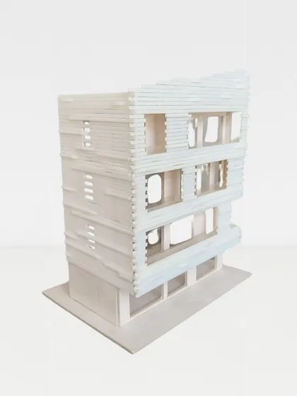 This model explores a more complex, layered facade. The tactile process of model-making allows for intuitive adjustments and a deeper understanding of how light and shadow will interact with the building's skin.