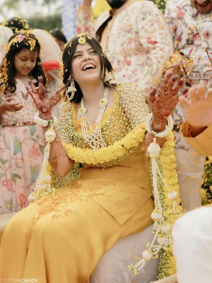 Pure joy and sunshine for this bride's Haldi ceremony. I aimed for a fresh, dewy, and glowing look that would last through all the fun and laughter, letting her natural happiness be the main highlight.