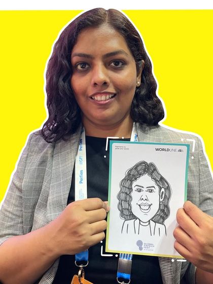 This guest loved her caricature from the Worldline event at BKC. The bright yellow background makes the artwork pop.