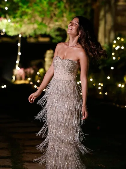 A real TMJ bride, Maia, adorned in our versatile Ruby & Diamond necklace, designed to be cherished on multiple occasions.